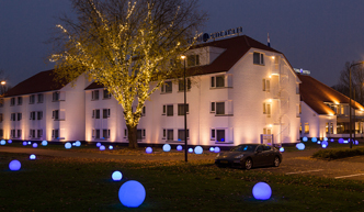 Pand van Fletcher Hotel-Restaurant 's-Hertogenbosch in het donker